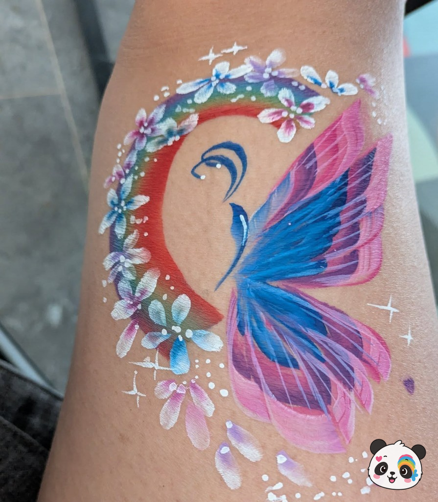 Colourful butterfly and rainbow arm painting with white flowers
